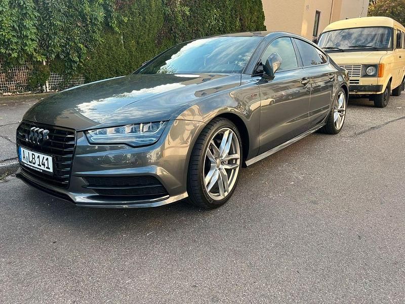 Grau Gebraucht 2017 Audi A7 Sportback Sport Kleinwagen | 31.499 € (Fairer Preis) - Bild 1/4