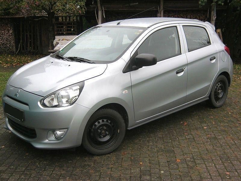 Grau Gebraucht 2013 Mitsubishi Space Star Kleinwagen | 4.200 € (Fairer Preis) - Bild 1/4