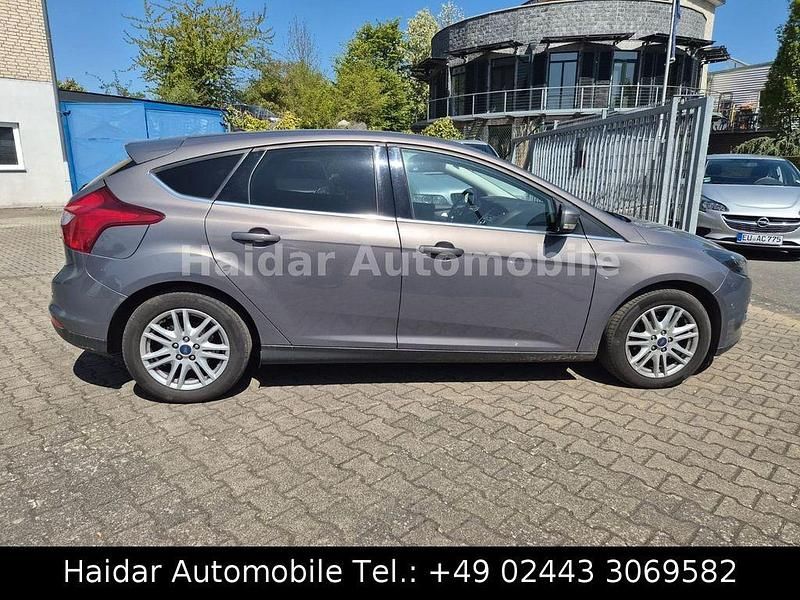 Occasion Ford Focus Titanium 125 ch (91 kW) 2014 Marron Berline