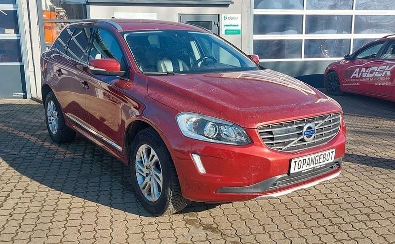 Flamenco red / metallic Gebraucht 2014 Volvo XC60 Summum SUV | 20.700 € (Teuer) - Bild 1/4