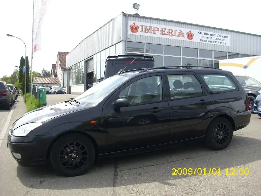 Second-hand Ford Focus 131 CP (96 kW) 2004 Negru Berlinǎ