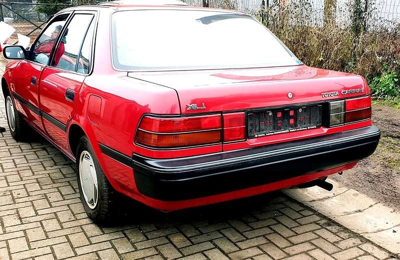 Rot Gebraucht 1990 Toyota Carina T1 Limousine | 1.200 € - Bild 1/4