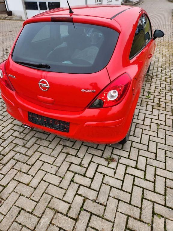 Gebraucht Opel Corsa Edition 69 PS (50 kW) 2011 Rot Kleinwagen