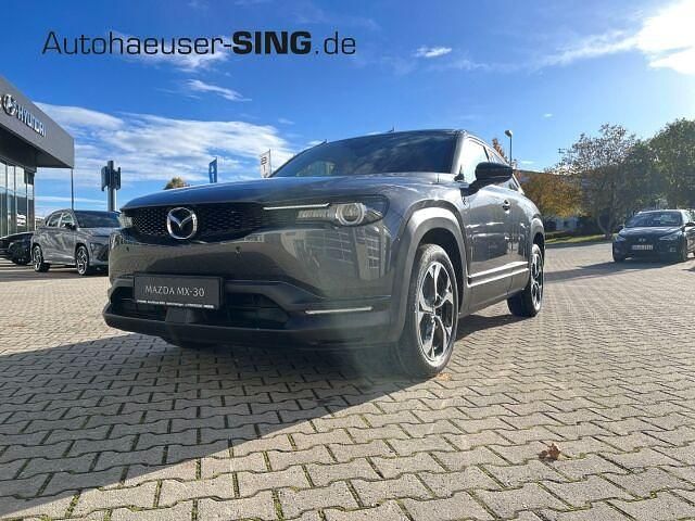 Machine grey Gebraucht 2023 Mazda MX30 Makoto SUV | 30.990 € (Etwas zu teuer) - Bild 1/4