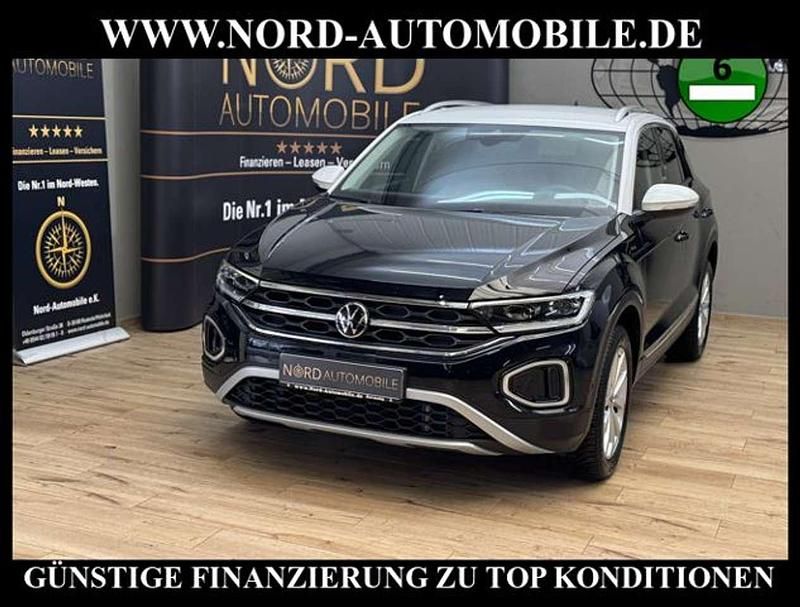 Deep black perleffek (metallic) Gebraucht 2024 VW T-Roc Style SUV | 27.900 € (Guter Preis) - Bild 1/3