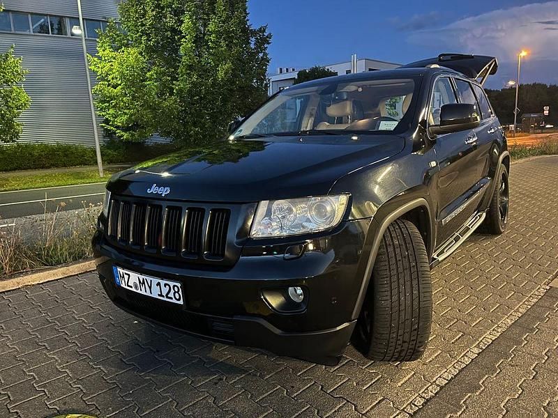 Schwarz Gebraucht 2012 Jeep Grand Cherokee SUV | 12.999 € (Etwas zu teuer) - Bild 1/4