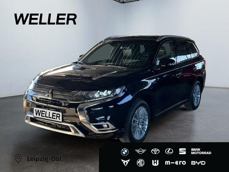 Schwarz Gebraucht 2020 Mitsubishi Outlander P-HEV Top SUV | 23.480 € (Etwas zu teuer) - Bild 1/3