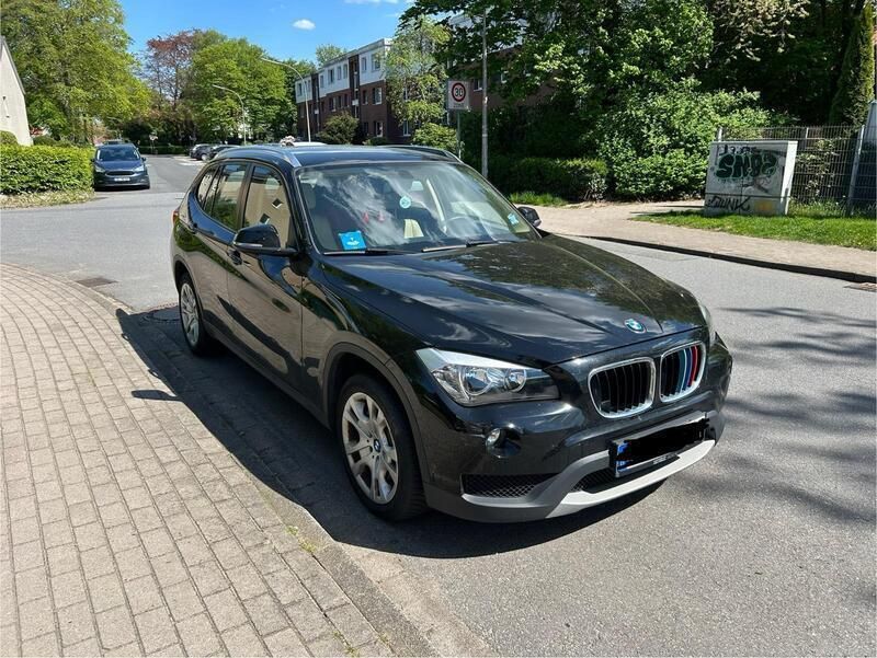 Schwarz Gebraucht 2012 BMW X1 SUV | 10.750 € - Bild 1/4