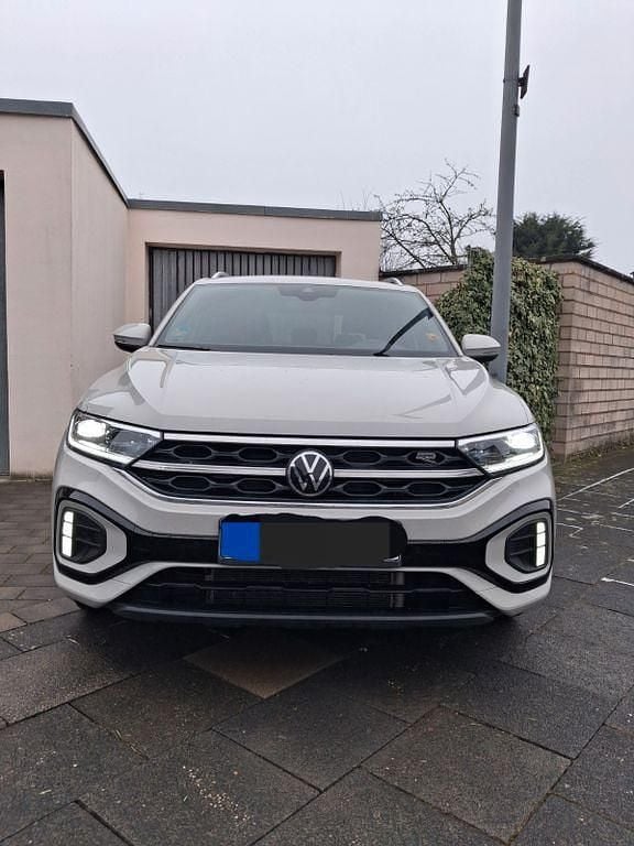 Grau Gebraucht 2024 VW T-Roc R-line SUV | 22.999 € (Superpreis) - Bild 1/4