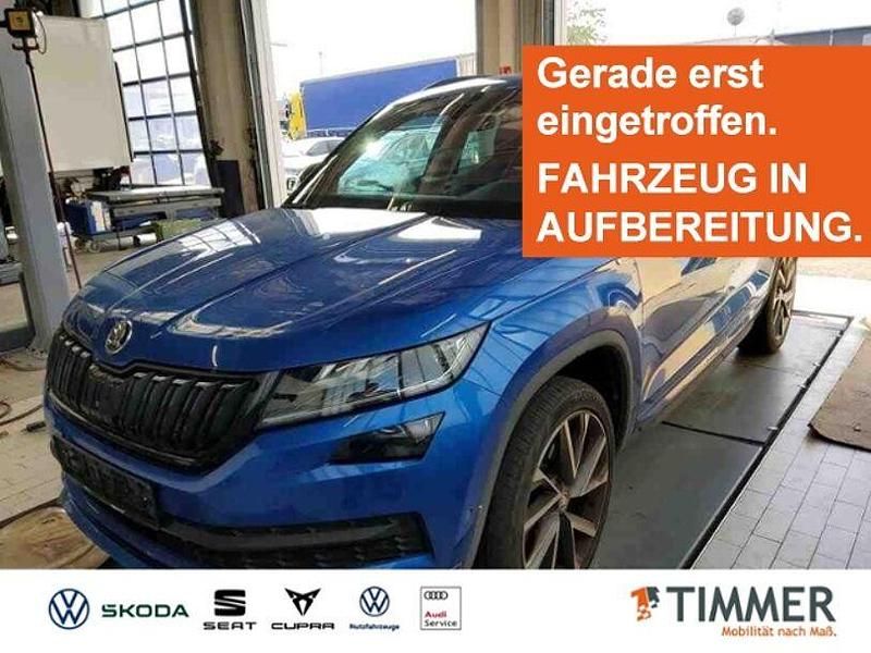 Race blau metallic Gebraucht 2021 Skoda Kodiaq SportLine SUV | 34.980 € (Etwas zu teuer) - Bild 1/4