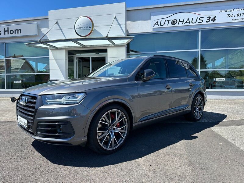 Grau (samuraigrau metallic) Gebraucht 2018 Audi SQ7 Ambiente SUV | 54.950 € (Teuer) - Bild 1/4