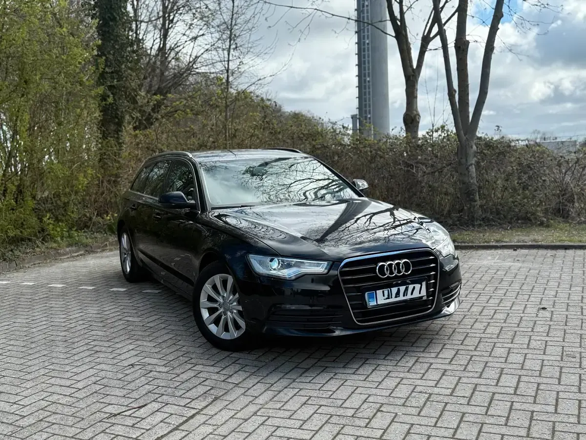 Używany Audi A6 190 KM (139 kW) 2014 Czarny Kombi