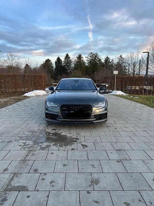 Grau Gebraucht 2016 Audi A7 Competition Limousine | 26.399 € (Fairer Preis) - Bild 1/4