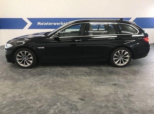 Second-hand BMW 520 Luxury Line 190 CP (139 kW) 2017 Negru Break
