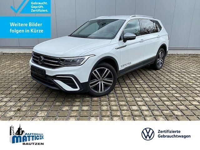 Pure white Gebraucht 2022 VW Tiguan Allspace Business SUV | 29.440 € (Fairer Preis) - Bild 1/4