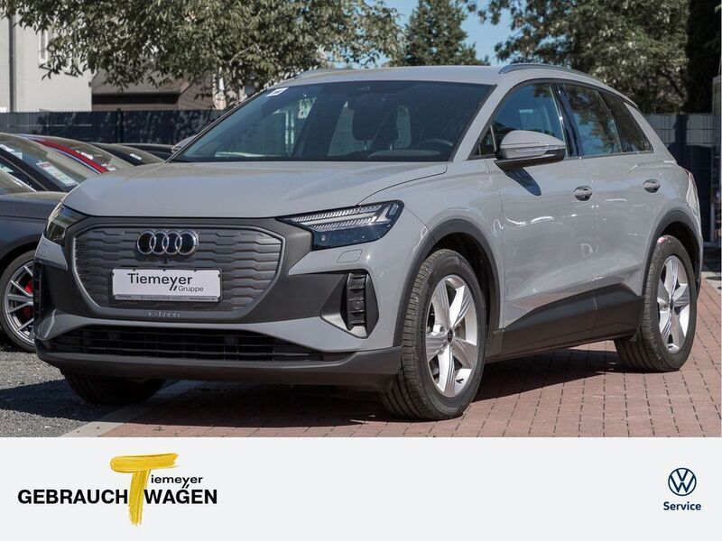 Grau Gebraucht 2021 Audi Q4 e-tron Design SUV | 25.290 € (Etwas zu teuer) - Bild 1/4