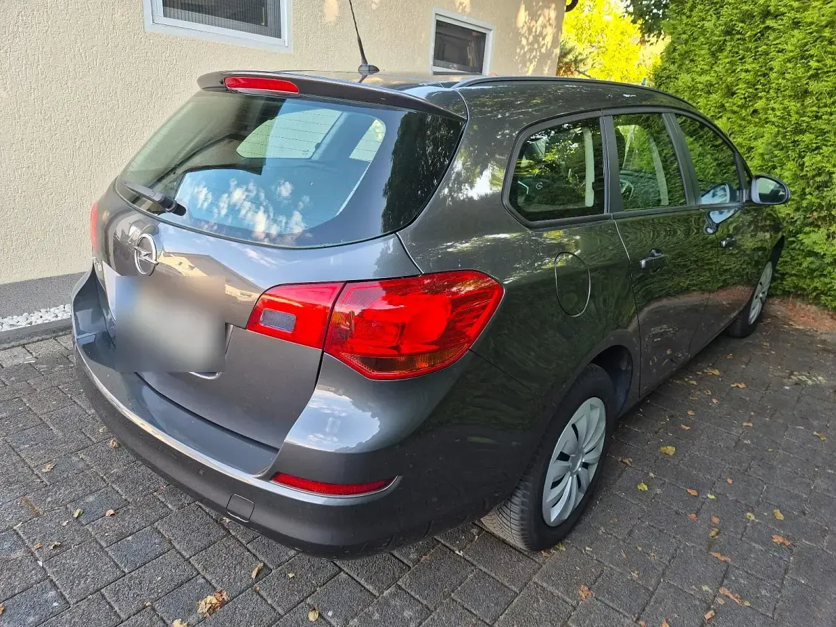 Gebraucht Opel Astra 120 PS (88 kW) 2011 Grau Kombi