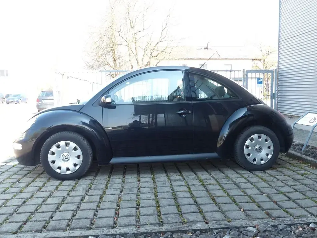 Gebraucht VW New Beetle 102 PS (75 kW) 2006 Schwarz Kleinwagen