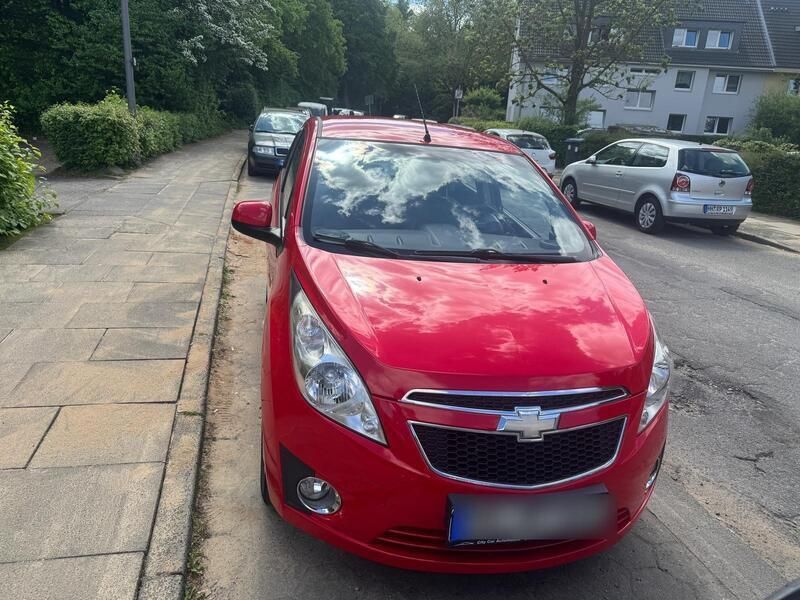 Rot Gebraucht 2012 Chevrolet Spark Kleinwagen | 3.000 € - Bild 1/4