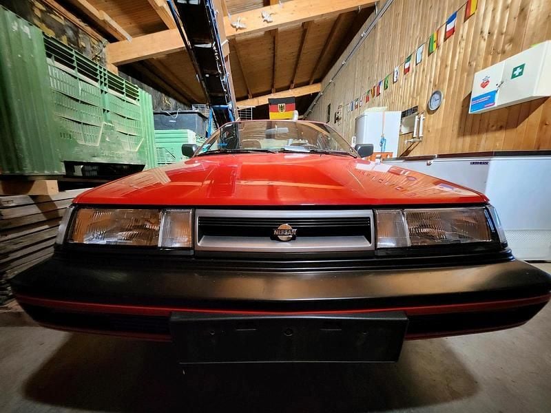 Gebraucht Nissan Sunny 90 PS (66 kW) 1990 Rot Coupé