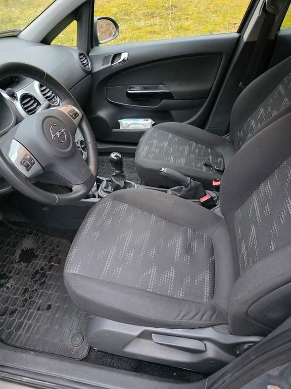 Gebraucht Opel Corsa Edition 101 PS (74 kW) 2011 Braun Kleinwagen