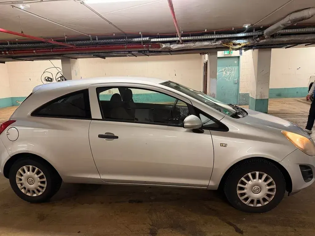 Gebraucht Opel Corsa 69 PS (50 kW) 2014 Silber Kleinwagen
