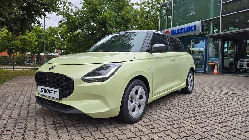 Cool yellow/mineral gray Neu 2025 Suzuki Swift Comfort Kleinwagen | 22.750 € - Bild 1/4