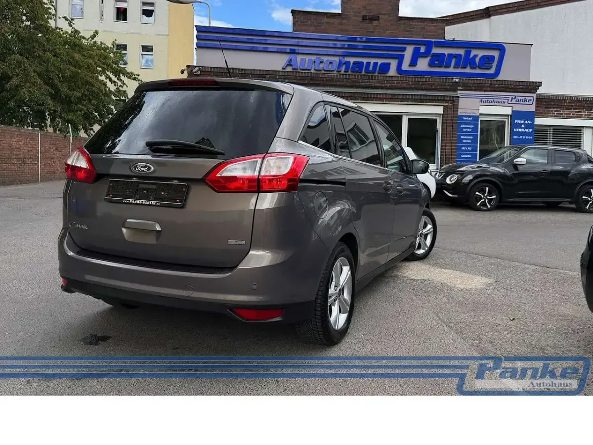 Gebraucht Ford Grand C-Max Champions Edition 101 PS (74 kW) 2013 Braun Van / Kleinbus