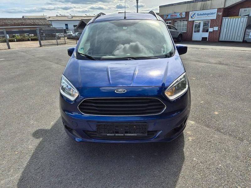 Blau Gebraucht 2014 Ford Tourneo Courier Titanium Van / Kleinbus | 5.999 € (Fairer Preis) - Bild 1/4