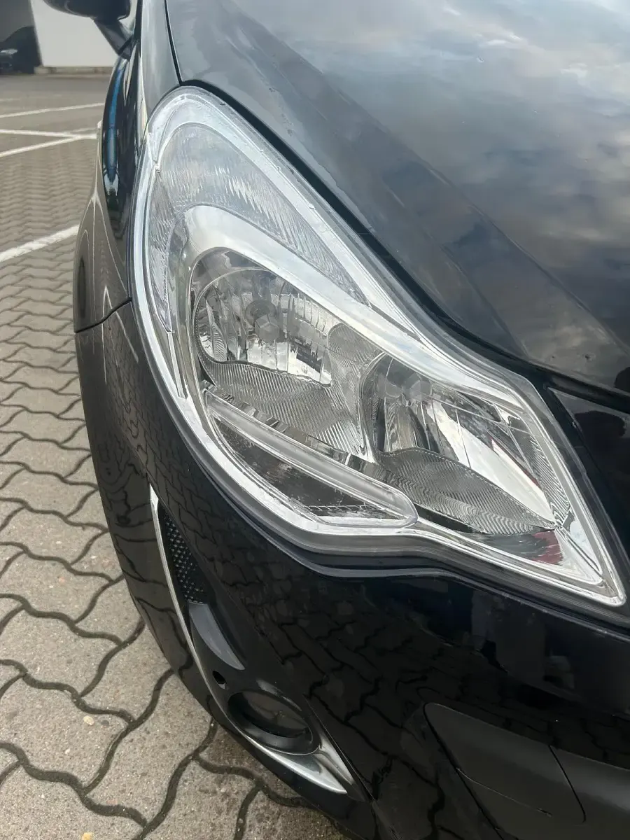 Gebraucht Opel Corsa 78 PS (57 kW) 2011 Schwarz Kleinwagen