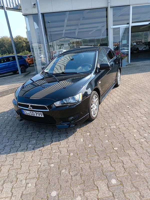 Schwarz Gebraucht 2013 Mitsubishi Lancer Edition Limousine | 4.500 € (Fairer Preis) - Bild 1/4