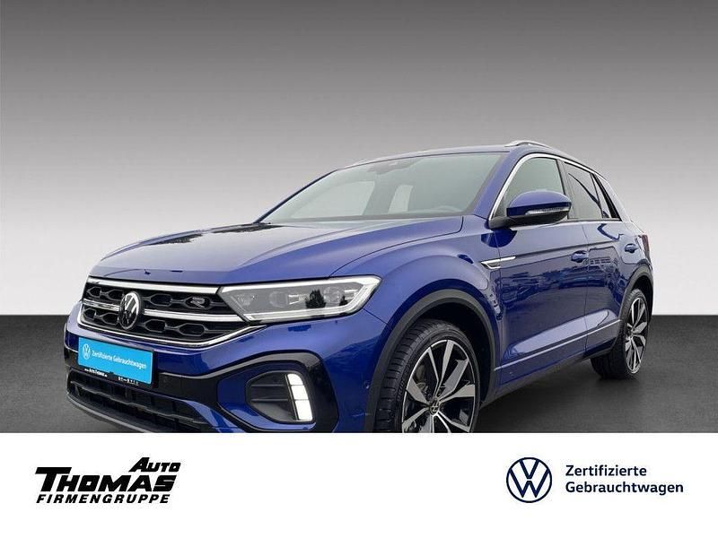 Lapiz blue metallic (metallic) Gebraucht 2024 VW T-Roc R-line Plus SUV | 27.700 € (Etwas zu teuer) - Bild 1/3