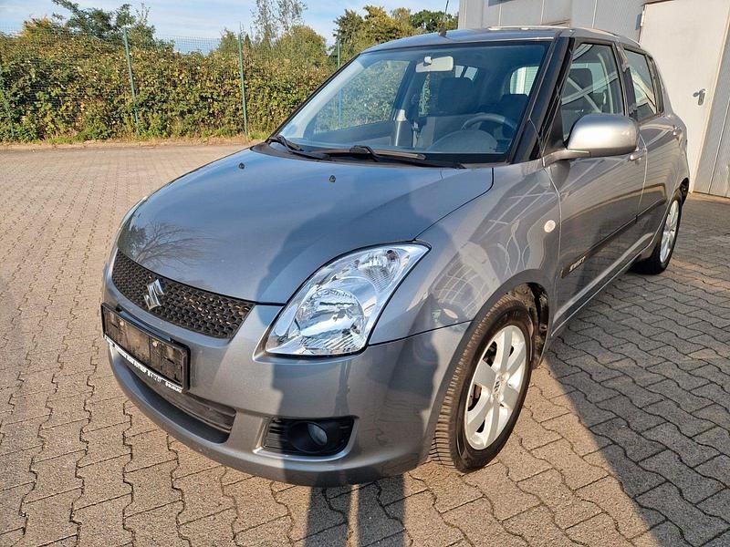 Grau Gebraucht 2010 Suzuki Swift Comfort Kleinwagen | 6.990 € (Etwas zu teuer) - Bild 1/4