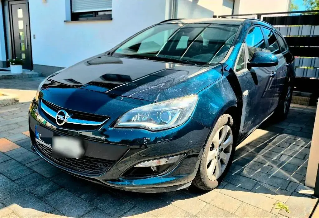 Gebraucht Opel Astra 100 PS (73 kW) 2015 Grün Kombi