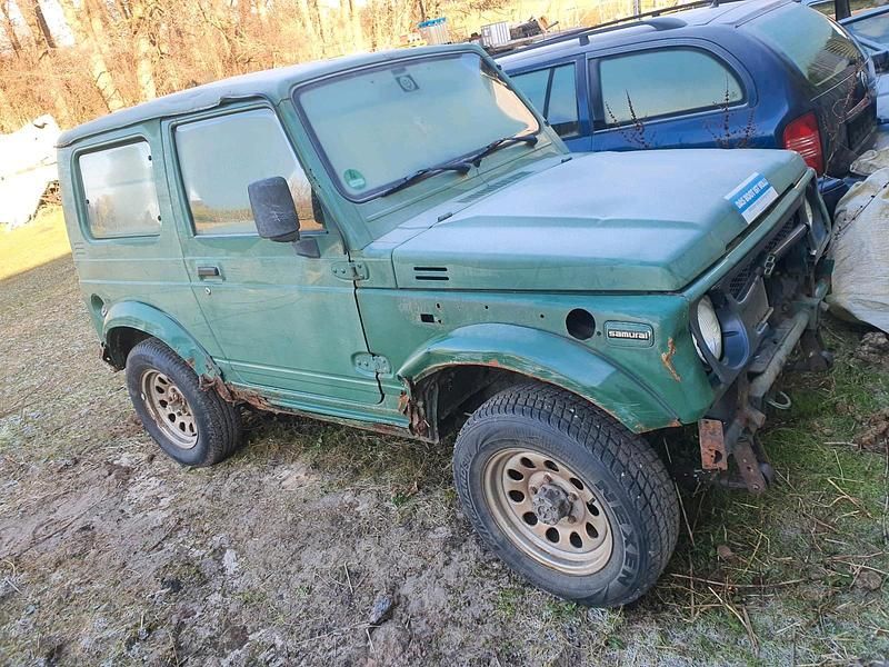 Grün Gebraucht 1997 Suzuki Samurai SUV | 1.150 € - Bild 1/4