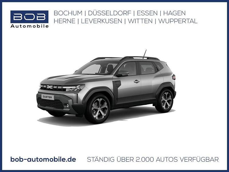 Dolomitgrau (grau) Neu 2025 Dacia Duster Journey SUV | 30.620 € - Bild 1/3