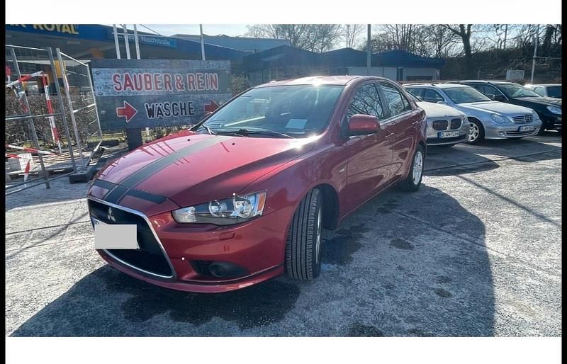 Gebraucht Mitsubishi Lancer 143 PS (105 kW) 2009 Rot Limousine