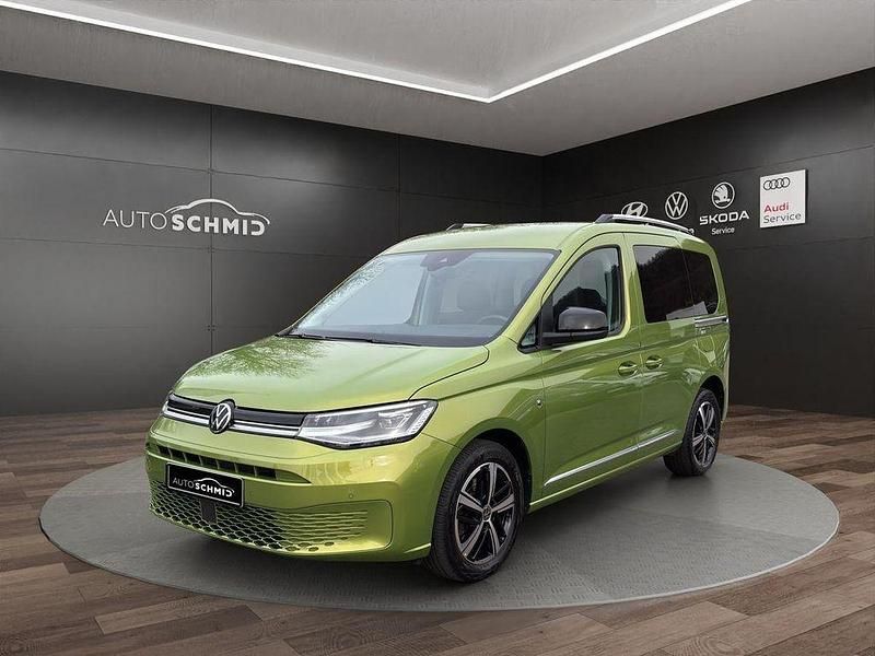 Golden green metallic Gebraucht 2021 VW Caddy Style Van / Kleinbus | 22.888 € (Guter Preis) - Bild 1/4