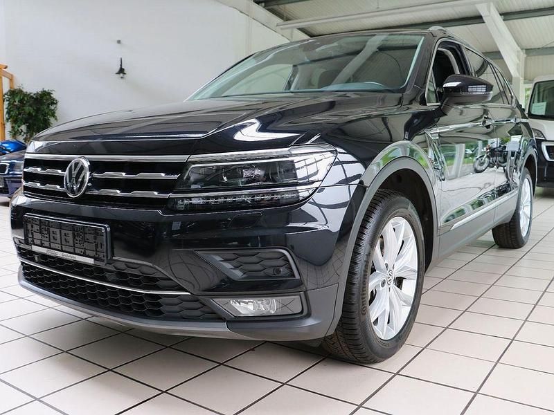 Schwarz Gebraucht 2021 VW Tiguan Allspace Highline SUV | 24.990 € (Fairer Preis) - Bild 1/4