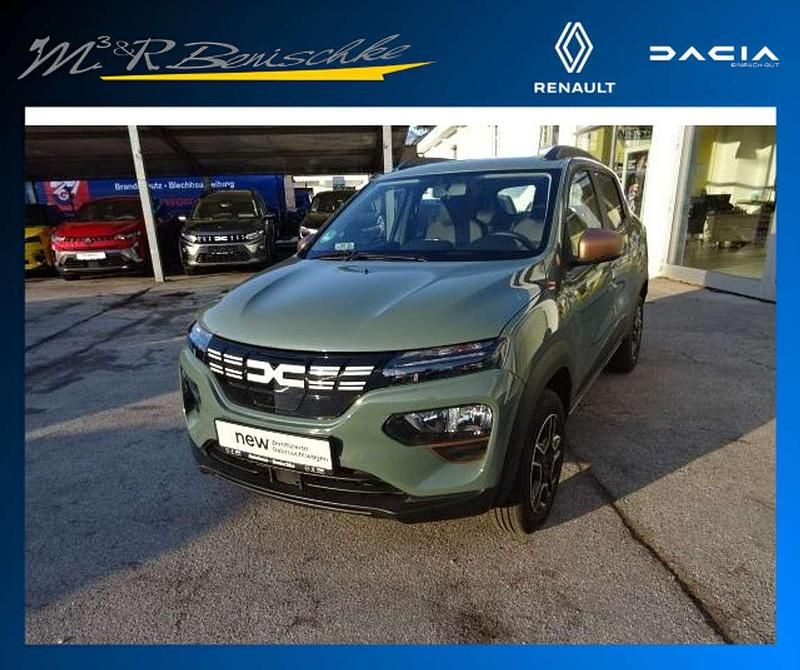 Gebraucht Dacia Spring Extreme 47 kW (65 PS) 2023 Olivgrün Kleinwagen