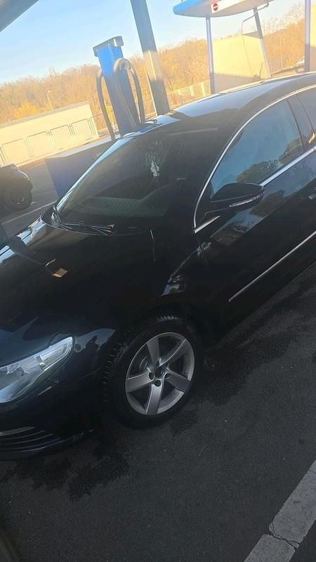 Second-hand VW Passat 160 CP (117 kW) 2011 Negru Berlinǎ