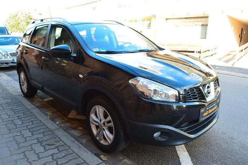 Schwarz Gebraucht 2011 Nissan Qashqai +2 Acenta Connect SUV | 5.999 € (Superpreis) - Bild 1/4