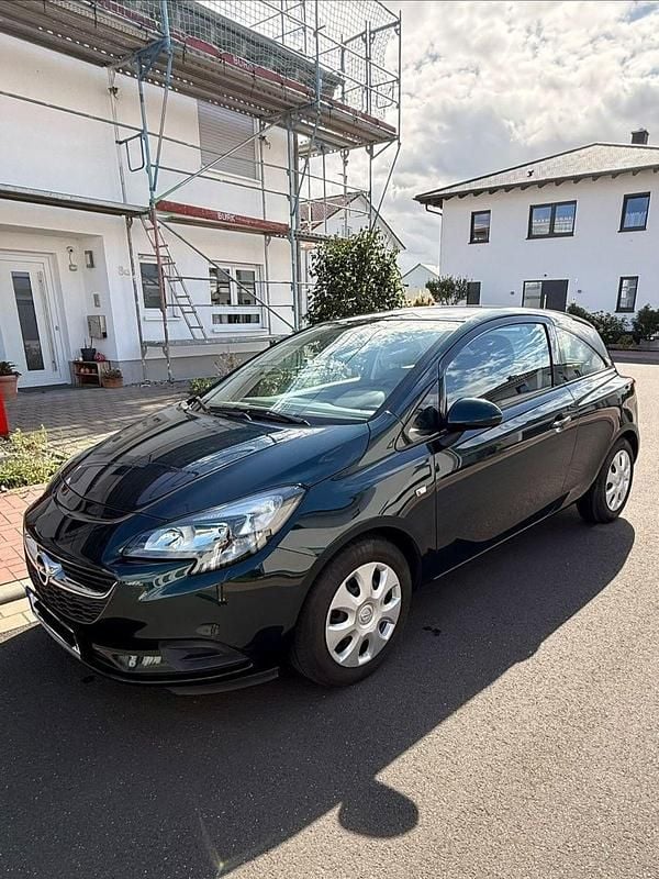 Grün Gebraucht 2015 Opel Corsa Edition Kleinwagen | 6.900 € (Fairer Preis) - Bild 1/4