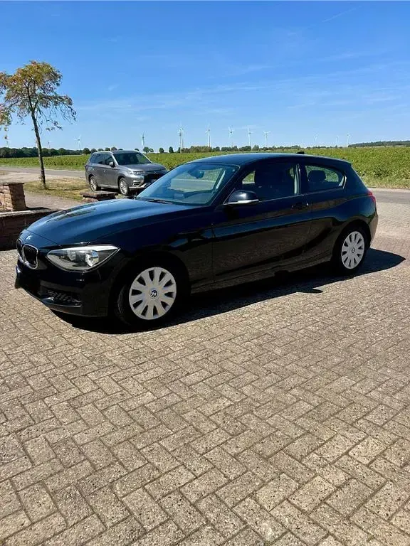 Gebraucht BMW 116 116 PS (85 kW) 2012 Schwarz Kleinwagen