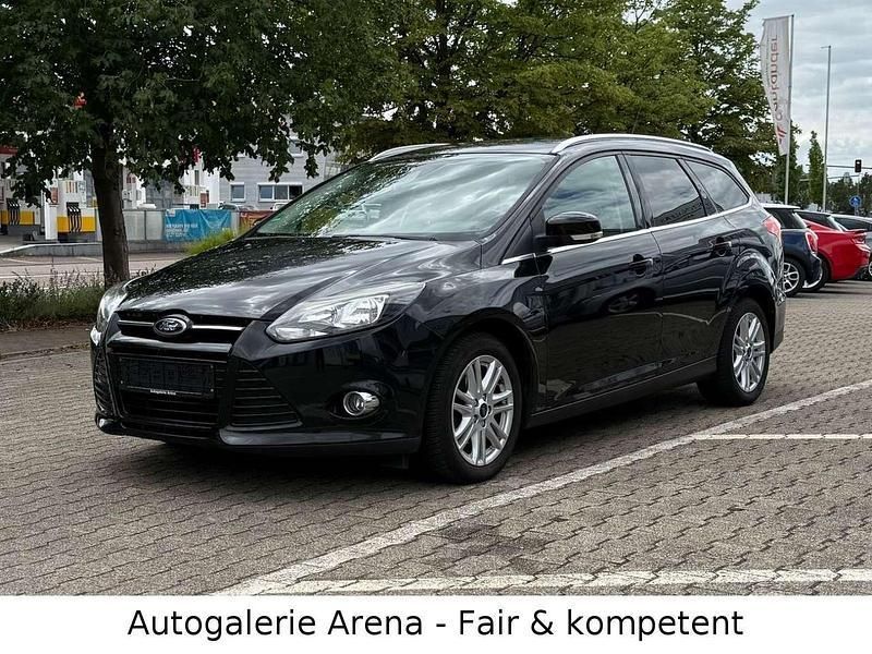 Pantherschwarz metallic Gebraucht 2013 Ford Focus Titanium Kombi | 6.990 € (Fairer Preis) - Bild 1/4