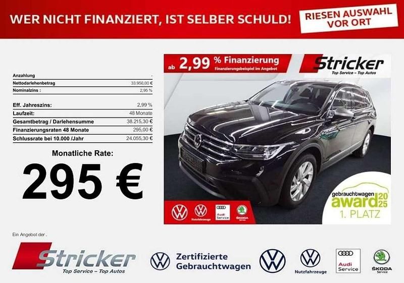 Deep black perleffekt (metallic) Gebraucht 2024 VW Tiguan Allspace Life SUV | 33.949 € (Superpreis) - Bild 1/3