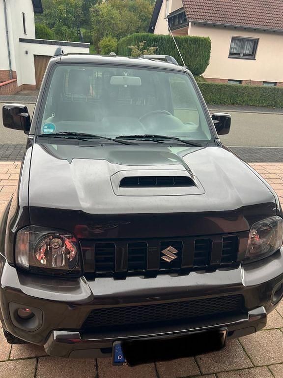 Braun Gebraucht 2015 Suzuki Jimny Style SUV | 16.500 € (Fairer Preis) - Bild 1/4