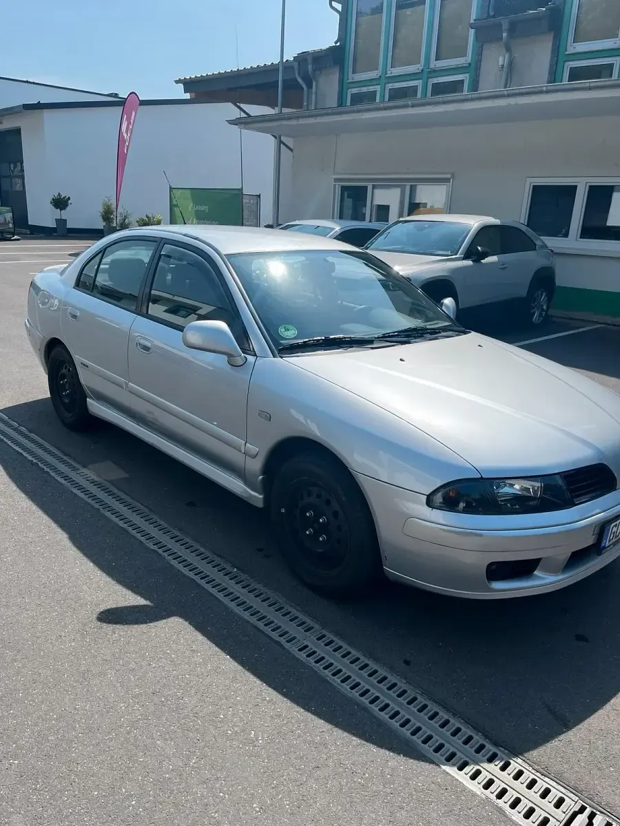 Gebraucht Mitsubishi Carisma 105 PS (77 kW) 2004 Grau Limousine