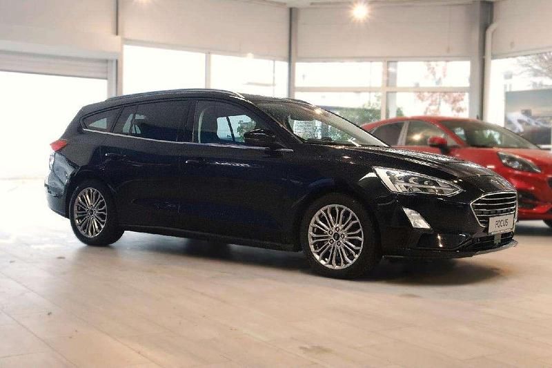 Gebraucht Ford Focus Titanium 125 PS (91 kW) 2019 Iridiumschwarz metallic Kombi