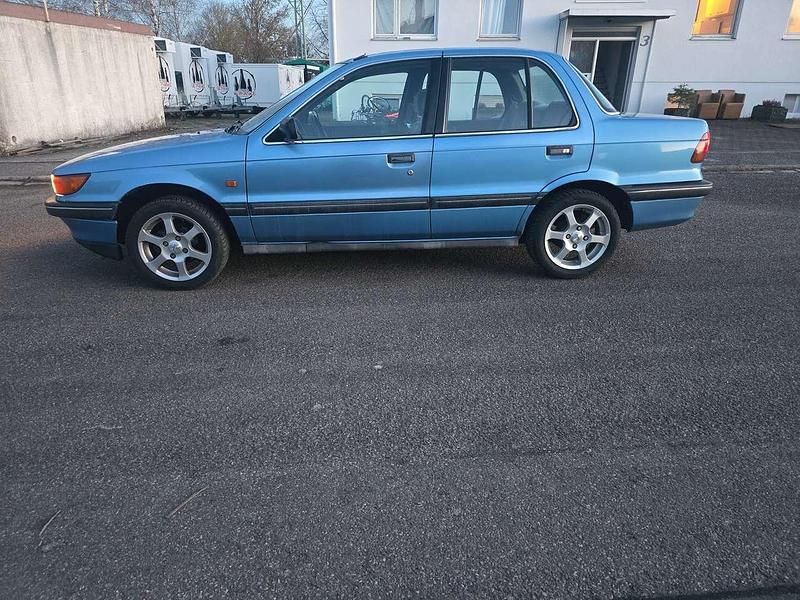 Gebraucht Mitsubishi Lancer 90 PS (66 kW) 1991 Blau Limousine